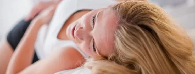Therapist providing a gentle massage treatment at CF Organic Wellness